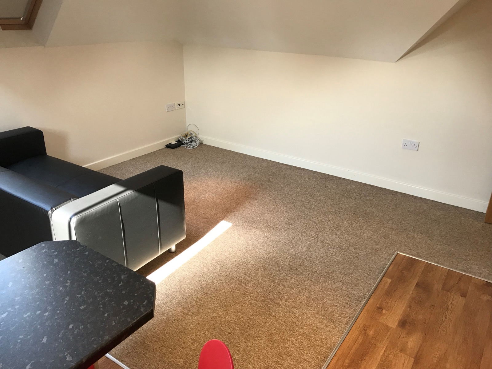 Living area in a two bedroom apartment at Conel Court