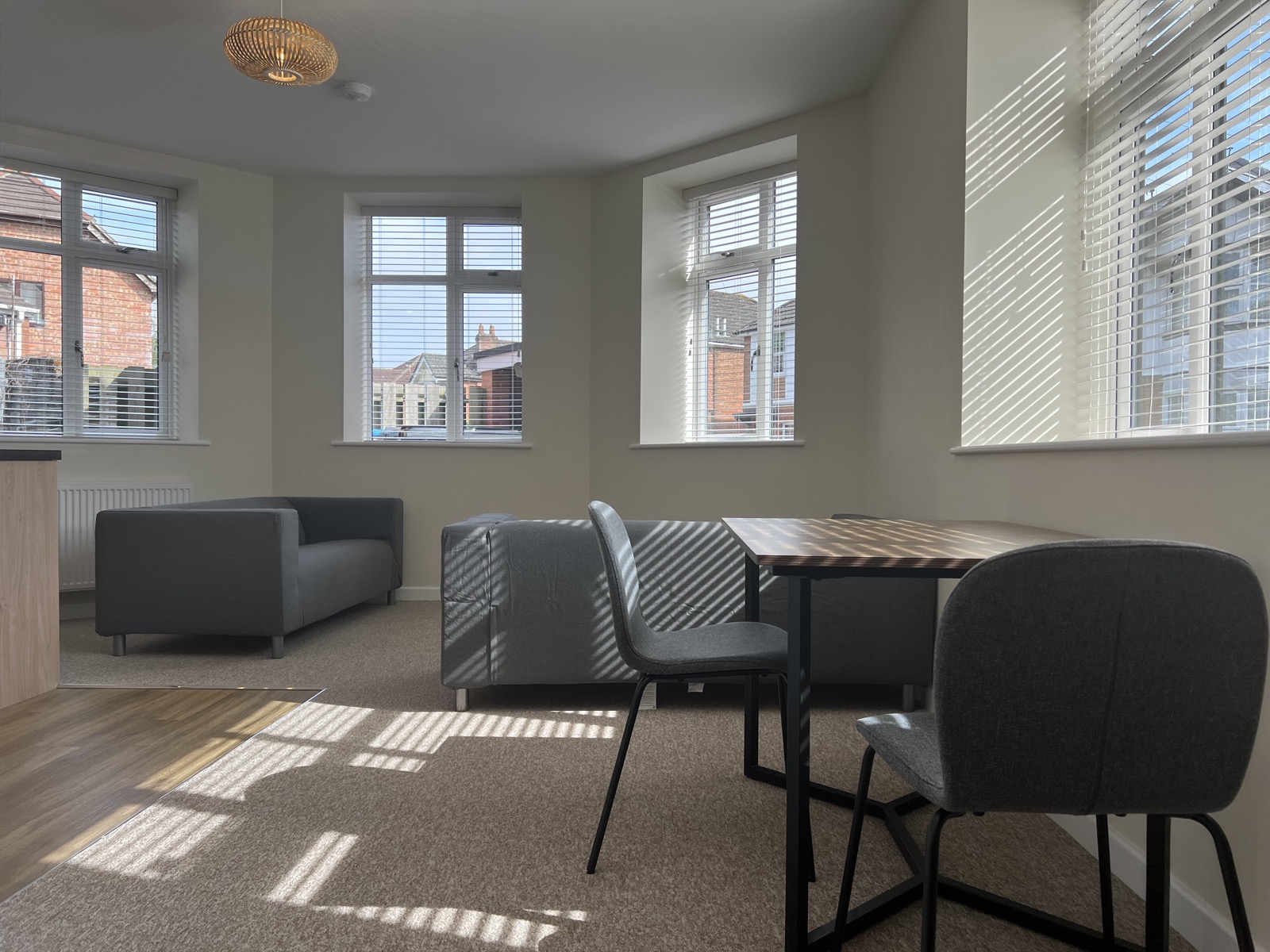 Open plan living space of a two bedroom apartment at Richmond Court