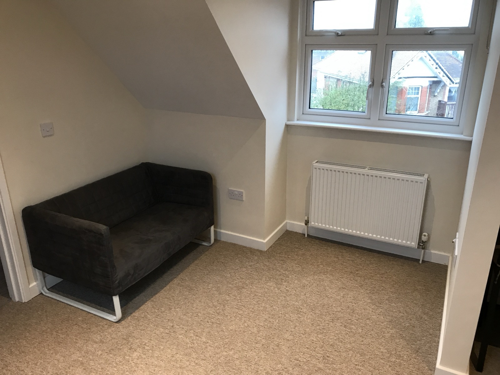 Lounge of a one bedroom apartment at Richmond Court